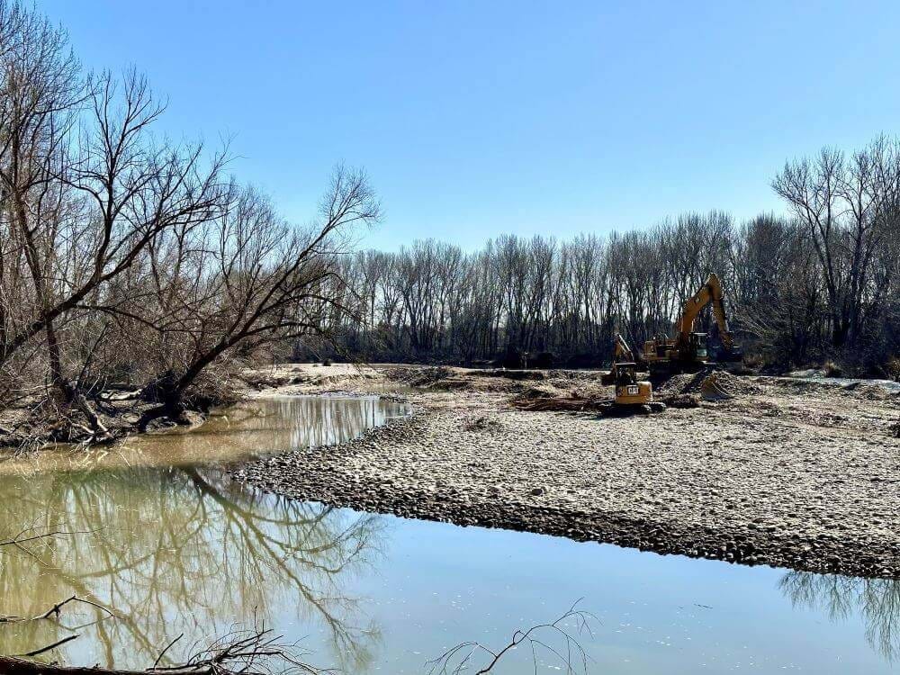 Heavy machinery on a river bank at Wylie Lane