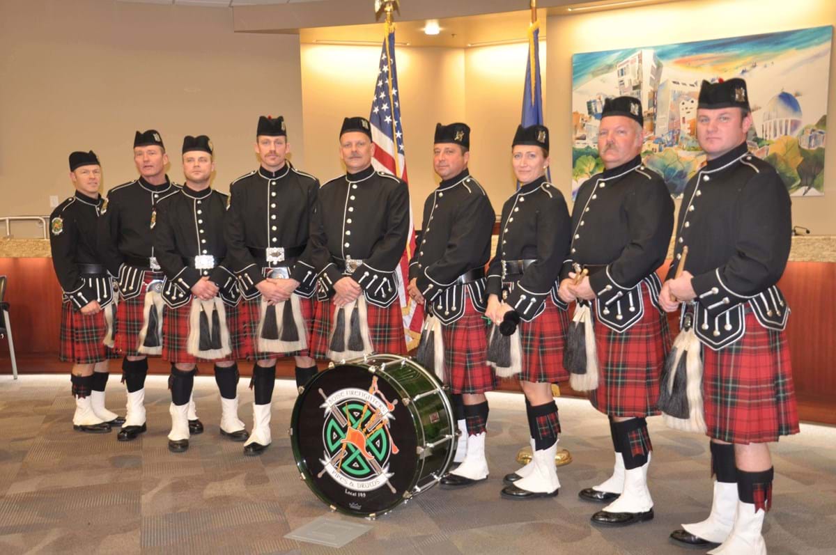 Boise Firefighters Pipes and Drums lined up in kilts