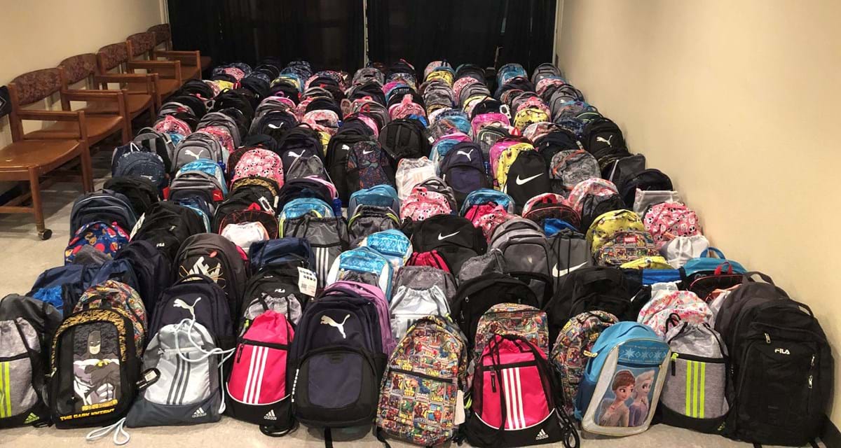 The Boise Police Association handed out more than 200 backpacks to kids in need.