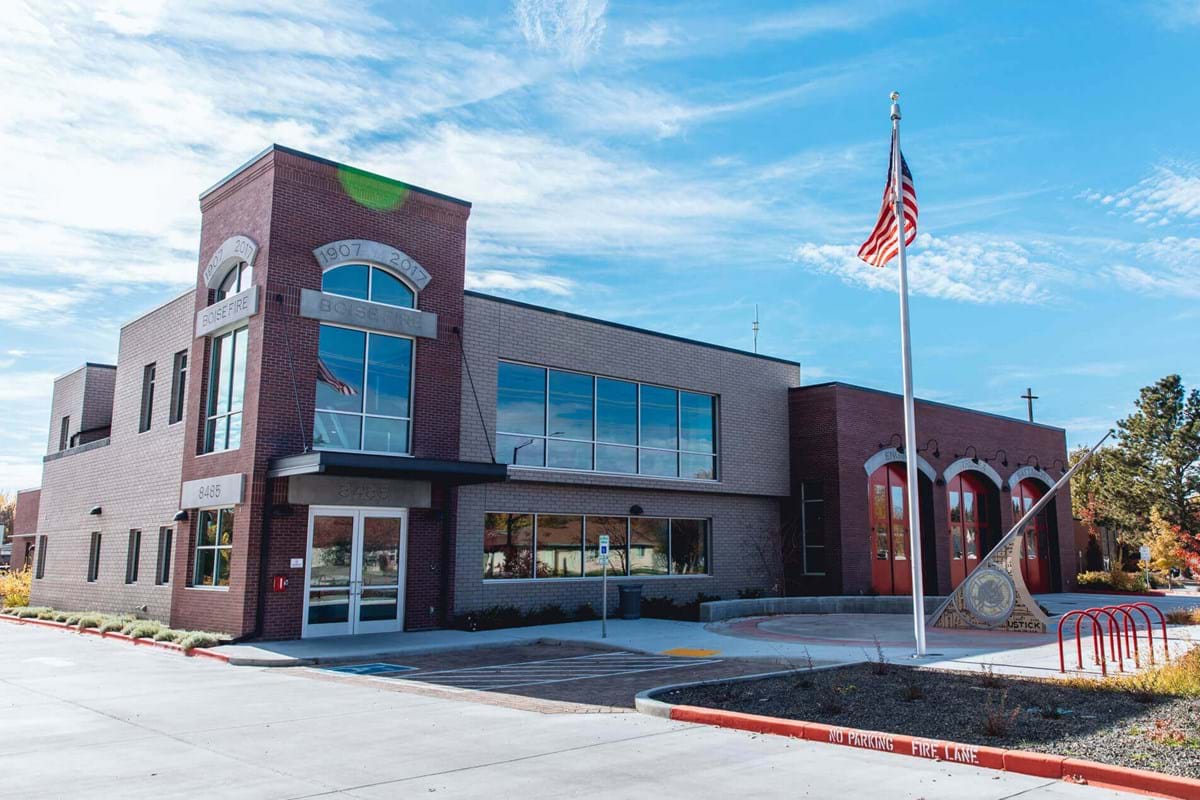 Fire station building with American flag flying in front