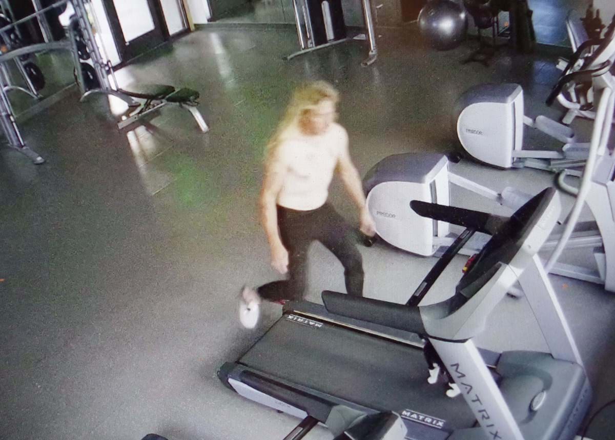 Person with long blond hair running on a treadmill