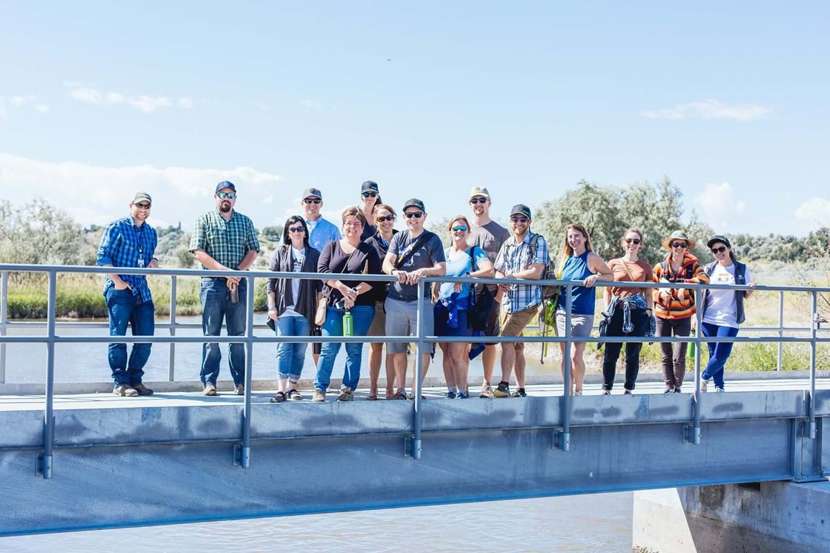 Group standing on bridge