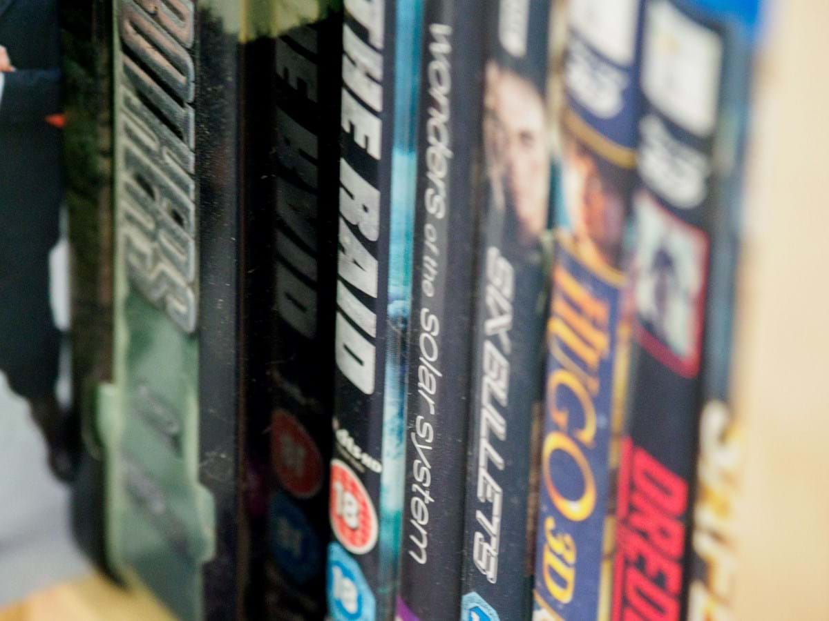 dvd cases on a shelf