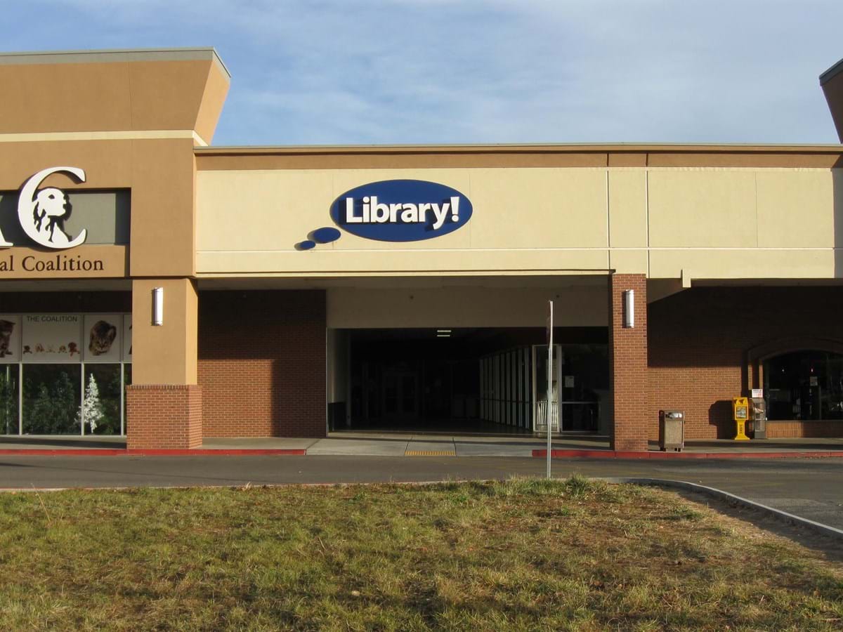 Exterior of Library! at Hillcrest with Library! logo sign above entrance