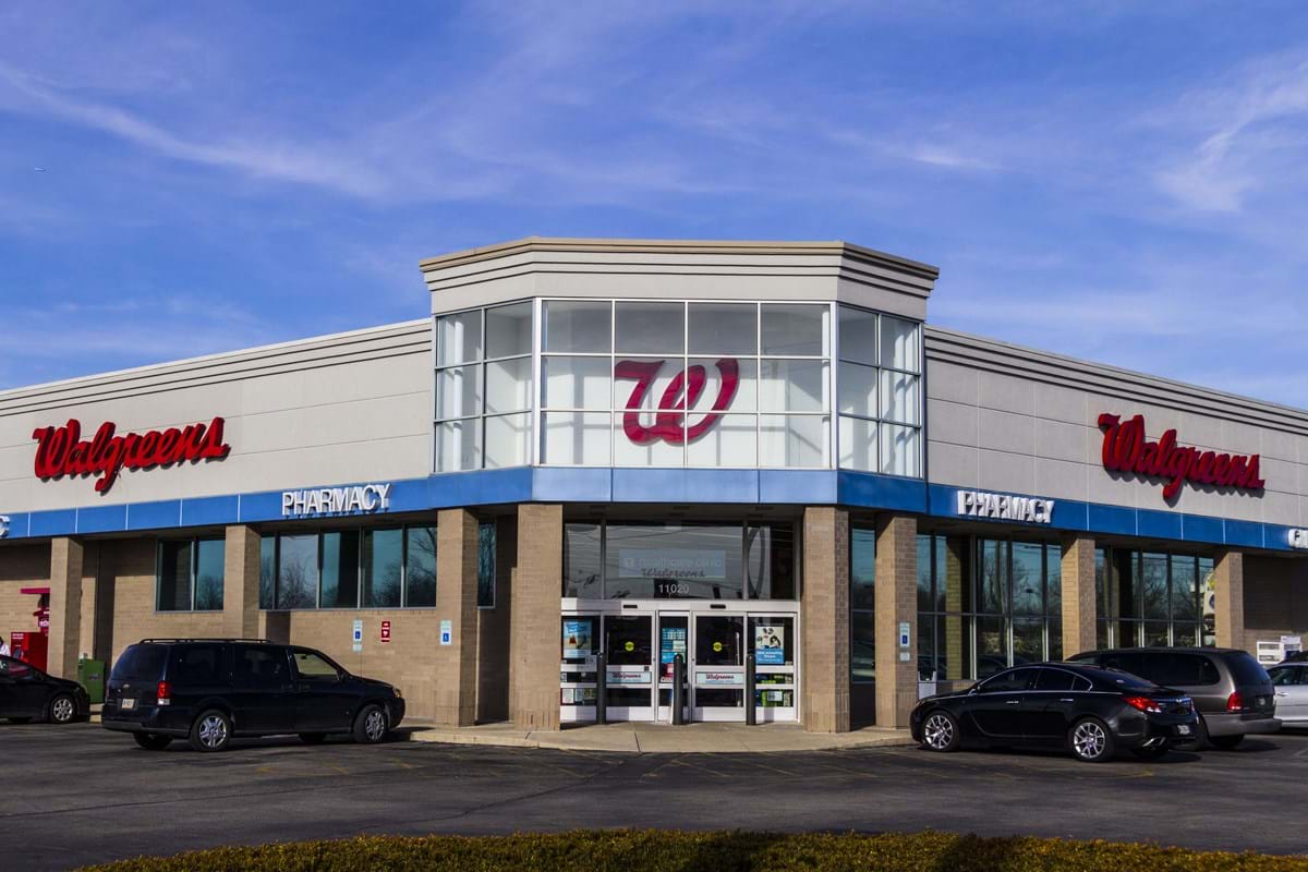 external image of Walgreens with blue skies and dispersed clouds.