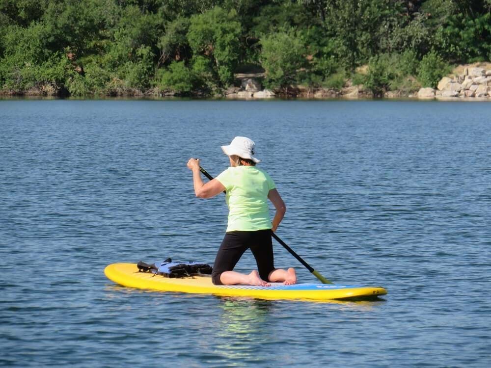 paddleboarder in a lake