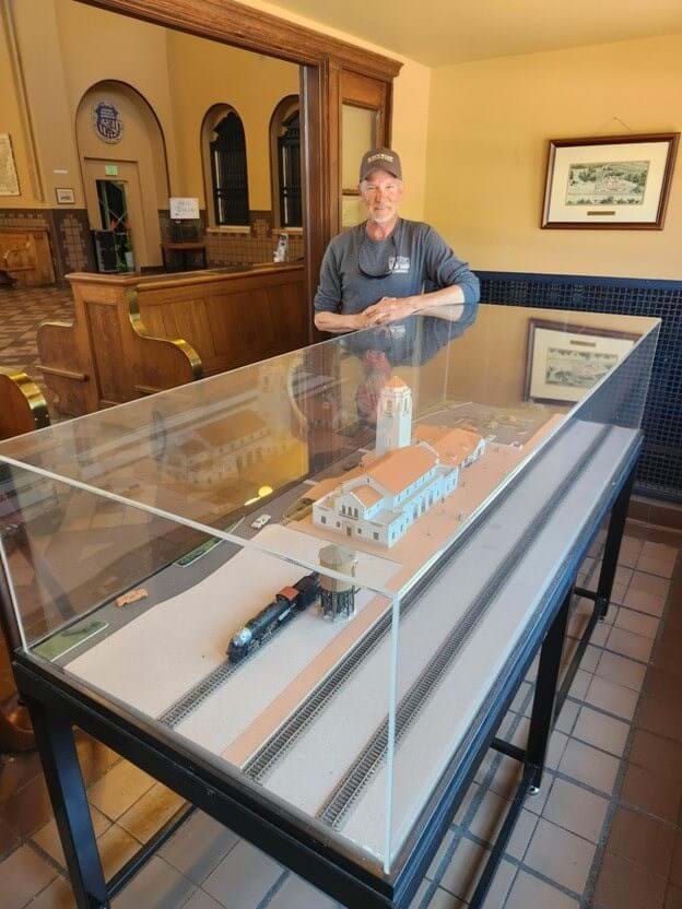 Model creator and builder David Knoll visits his masterpiece at the Boise Depot in June 2023