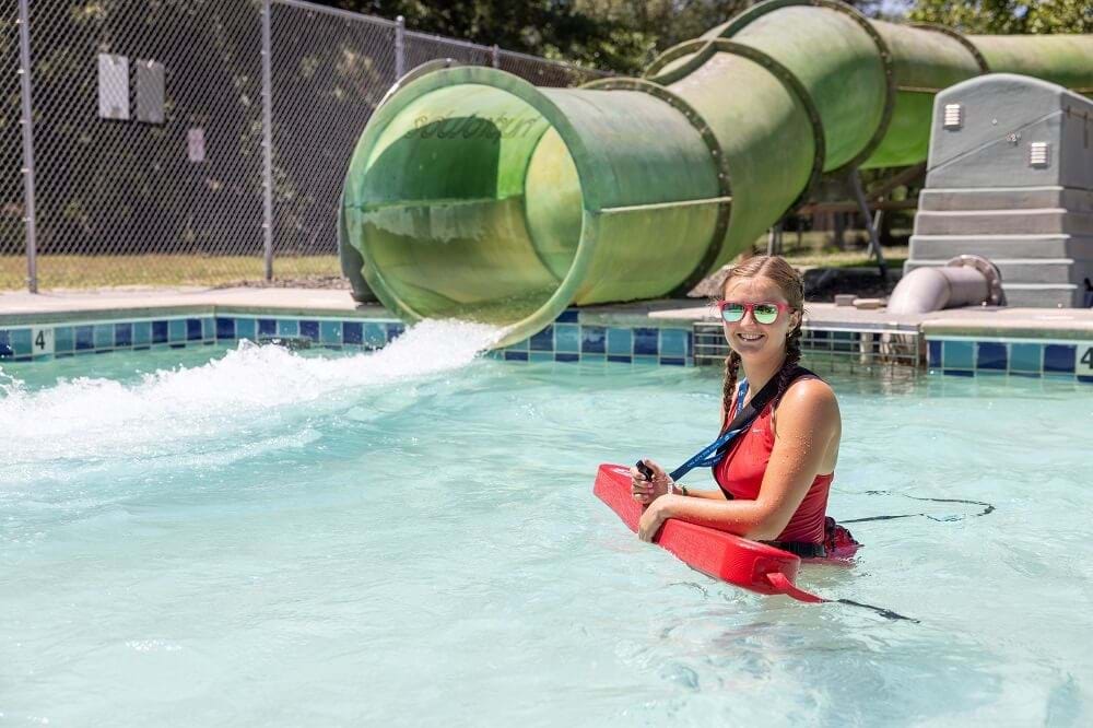 female lifeguard at a swimming pool