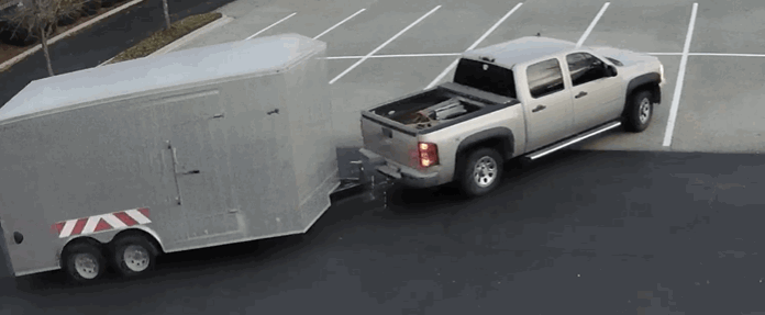 A surveilance photo of a truck attached to a stolen trailer