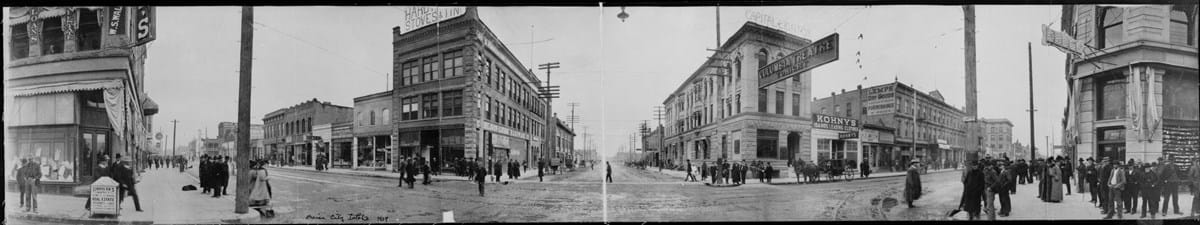 Historic black and white panoramic images of 8th and main street circa 1907