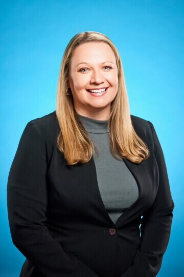 Meredith Stead smiling in front of City Hall.