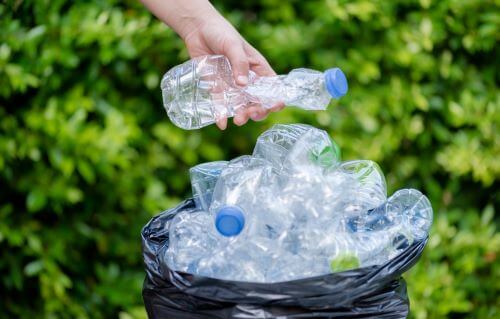 Throwing away plastic bottles