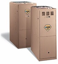 Two upright furnaces in beige color