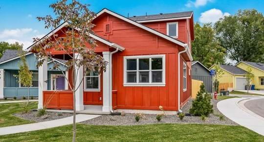 A newly-built house from the outside during the day.
