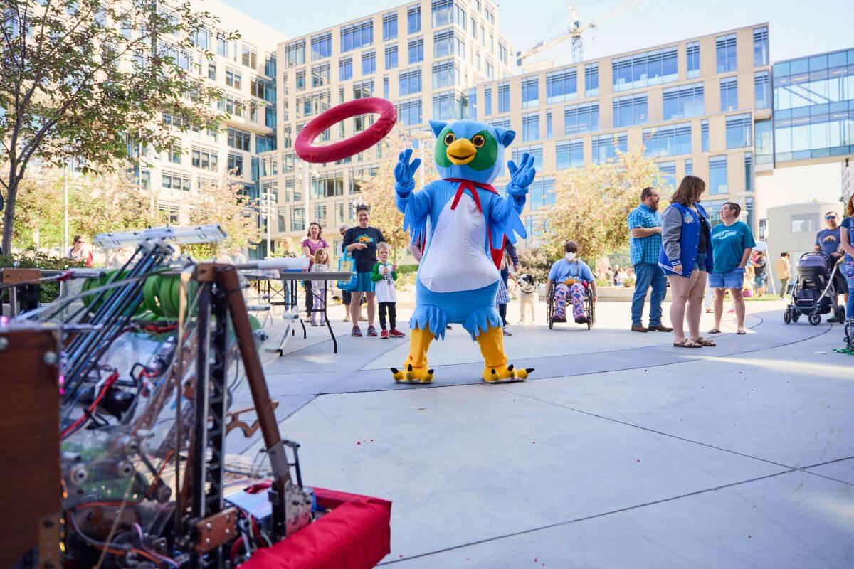 Library mascot at JUMP event