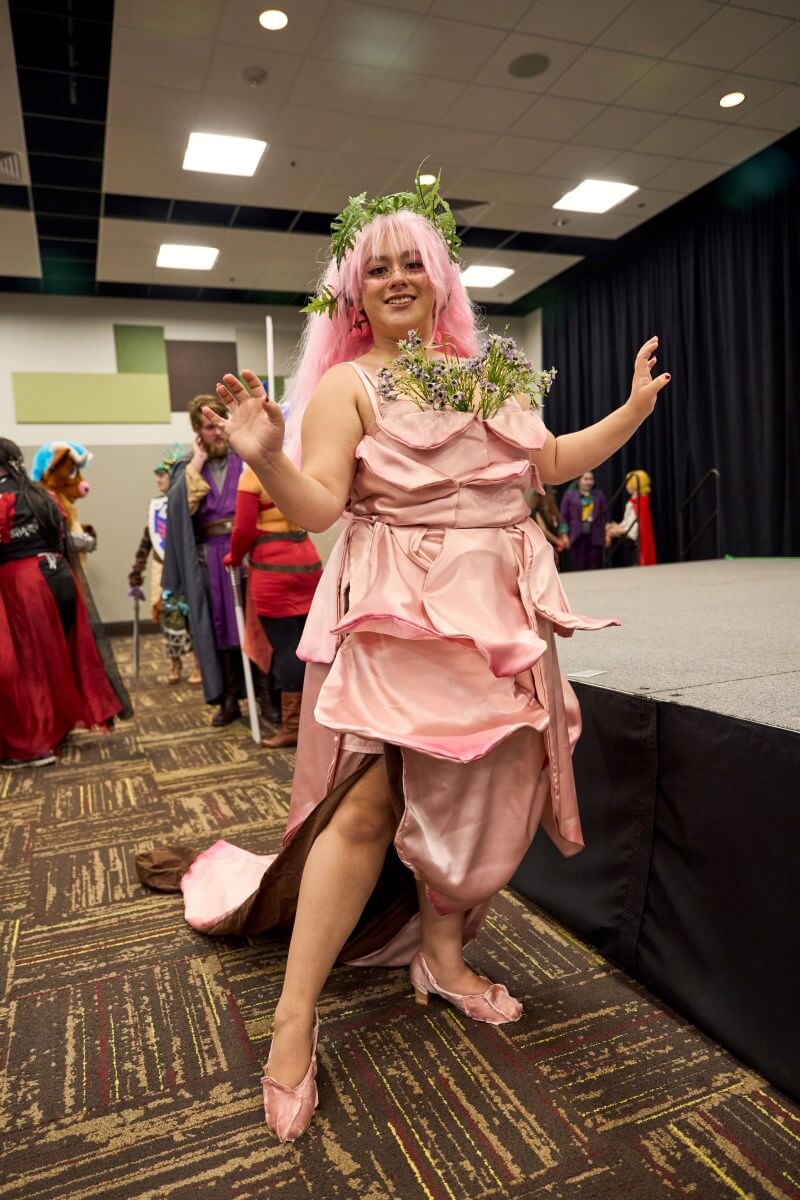 BCAF cosplayer poses indoors.