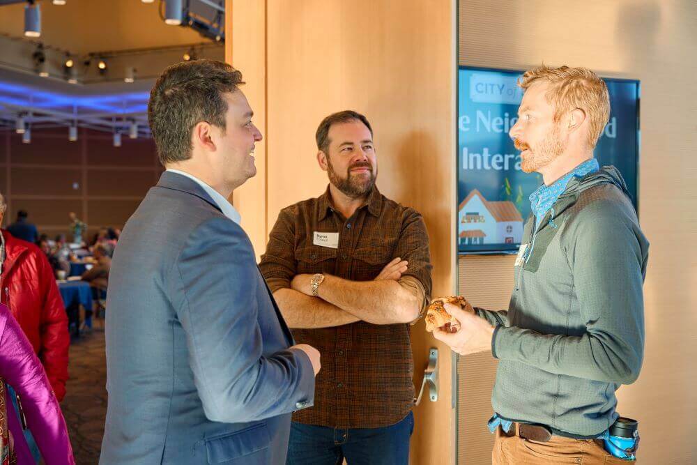 Neighbors networking at BNI event.