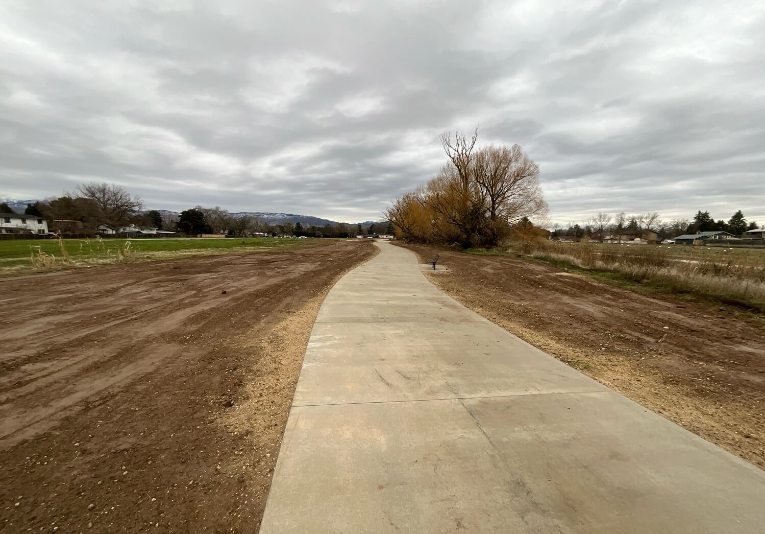 New accessible concrete pathways connect throughout the property (2026).