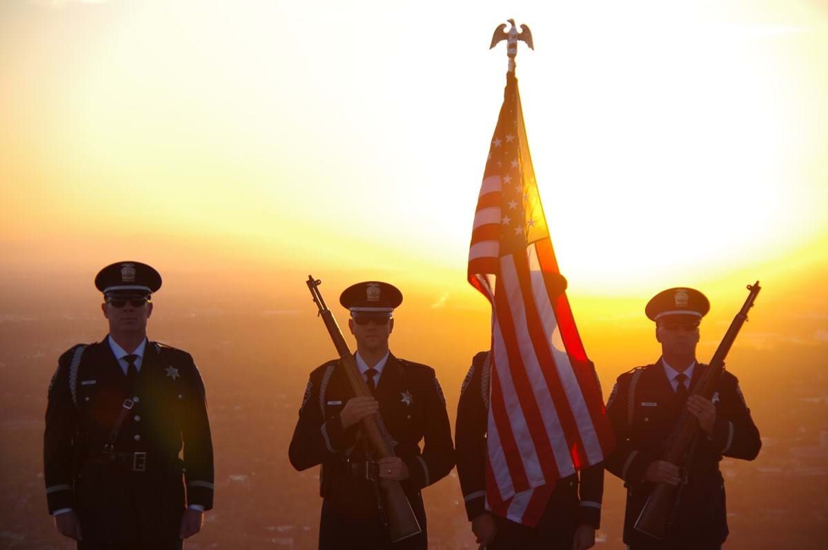 Honor guard holding American flag
