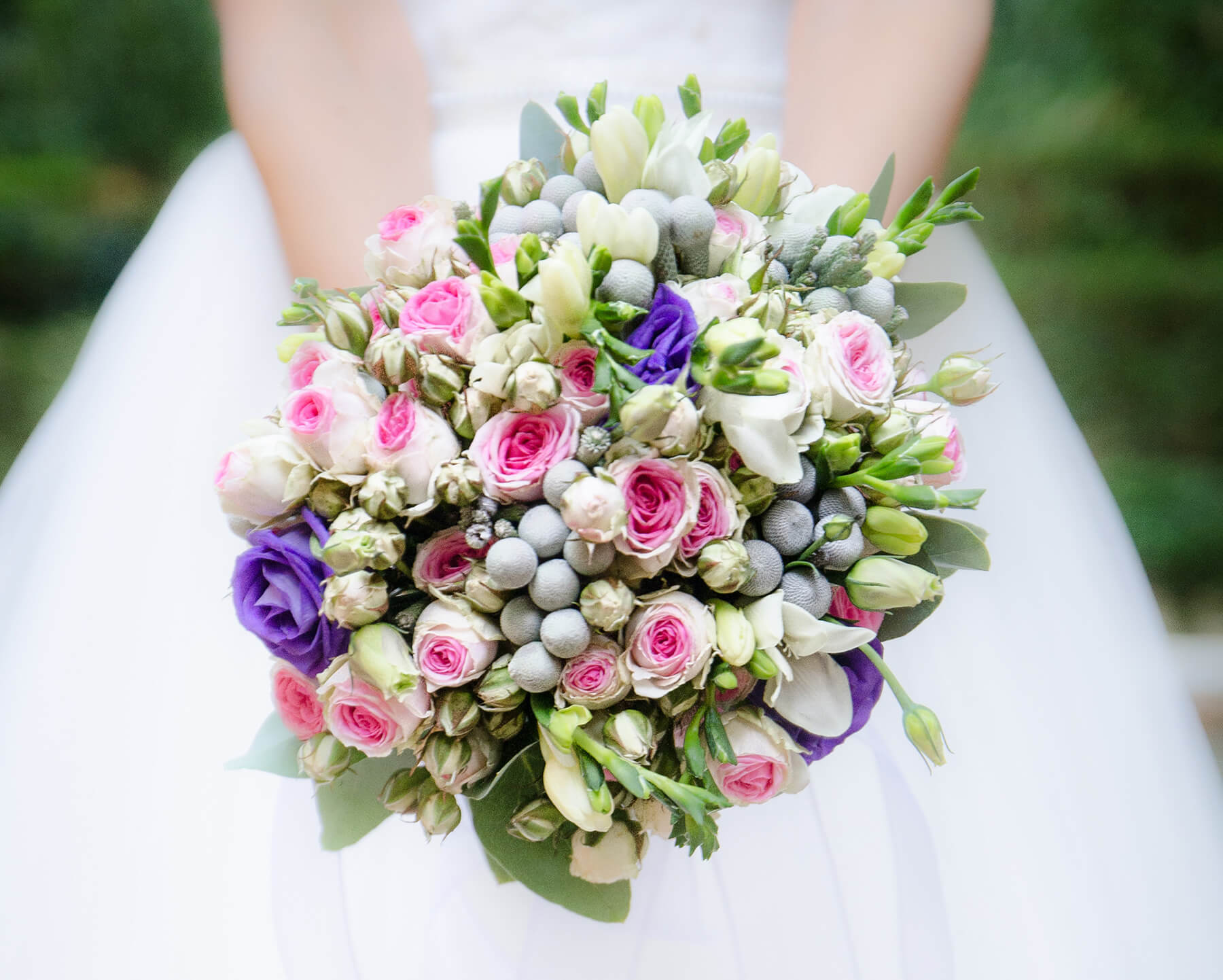 Bride holding a floral boquet