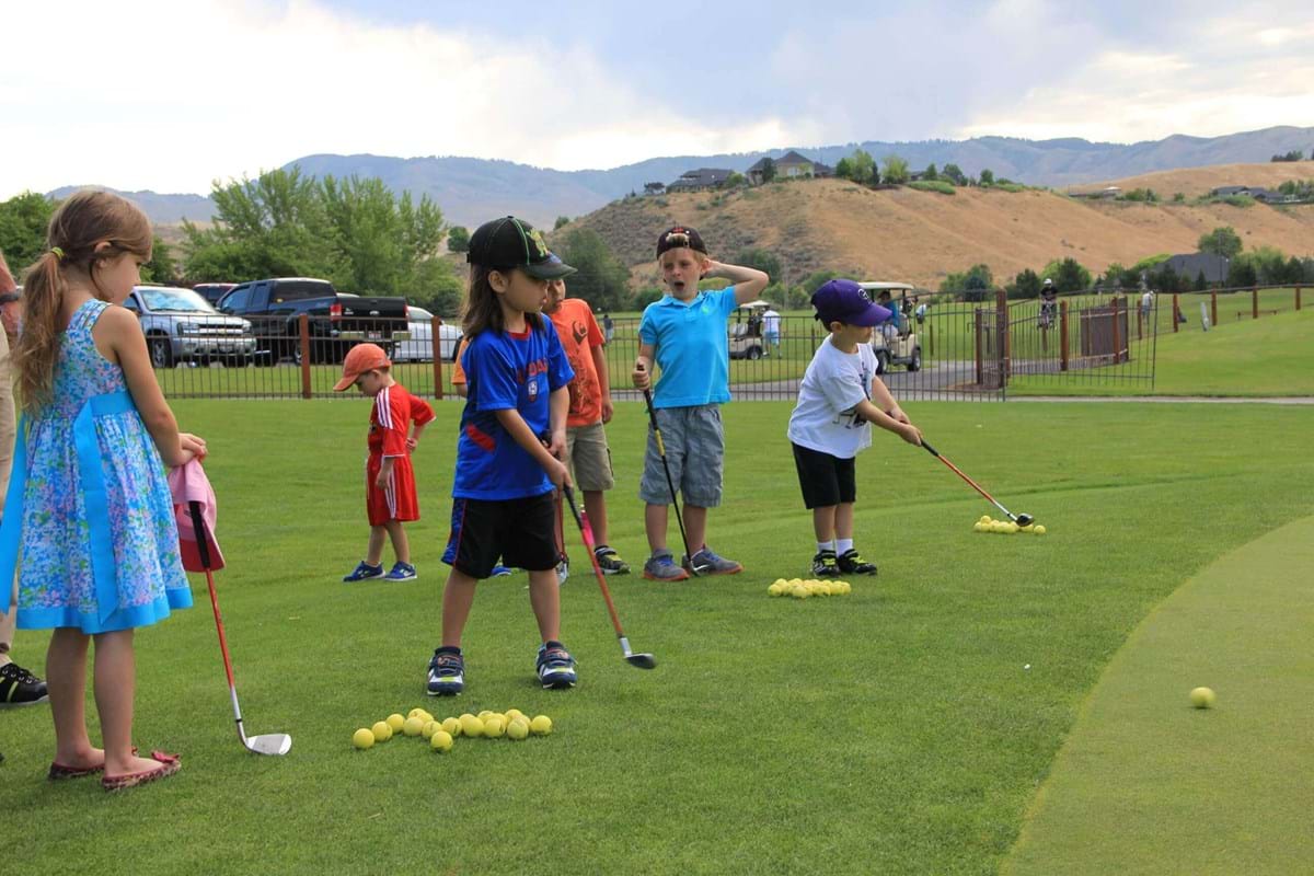 group of kids playing golf at warm springs golf course