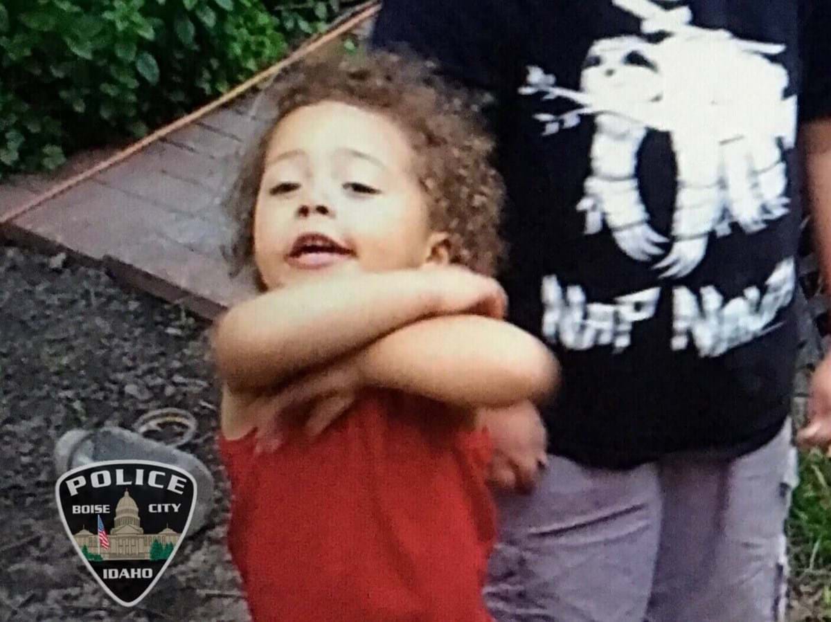 Bentley is a 2-year-old black male child with curly hair last seen wearing a long sleeve gray shirt and a diaper.
