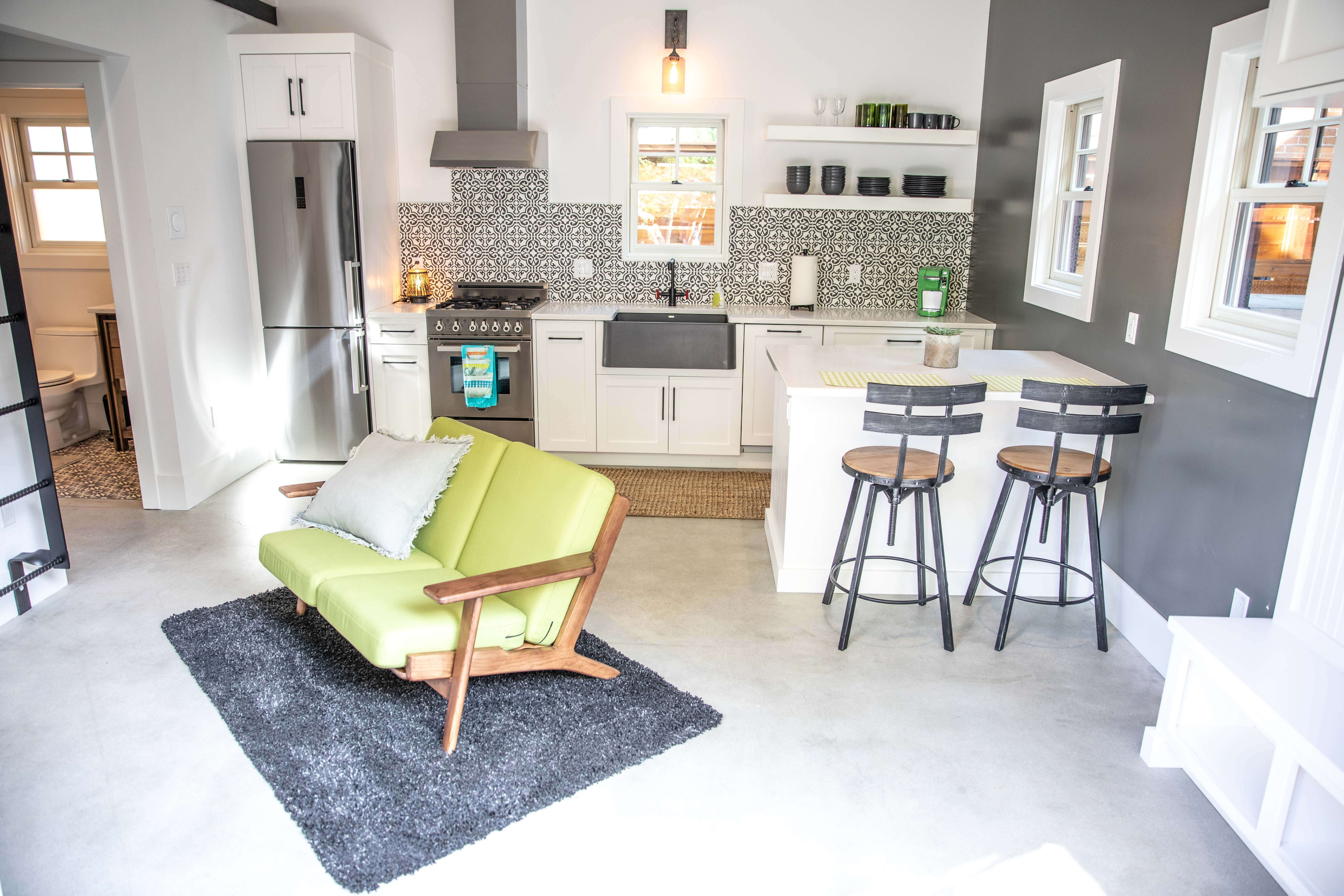 A garage in an alley with living space above.